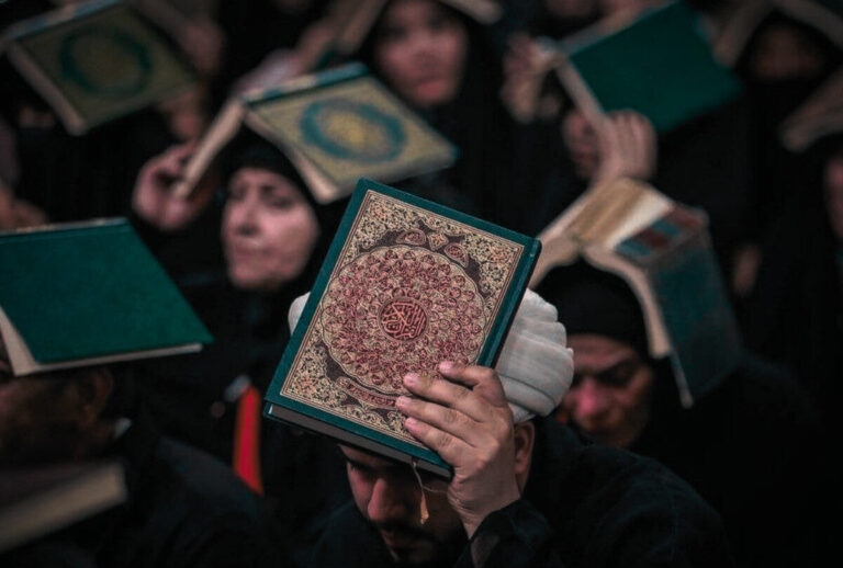 Why do Muslims raise the Quran on their heads on Laylatul Qadr?